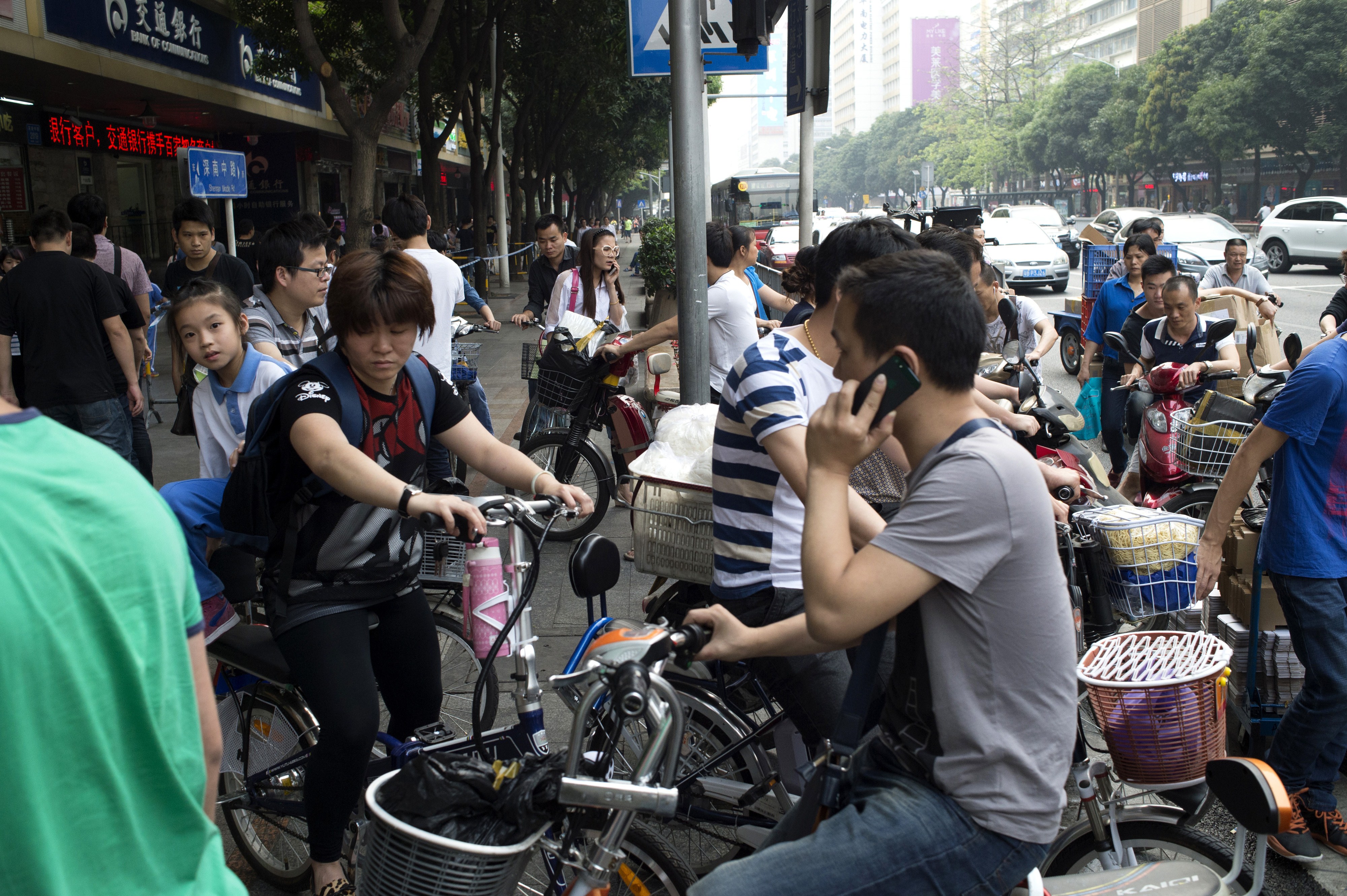 Cyclists and cell phones in China