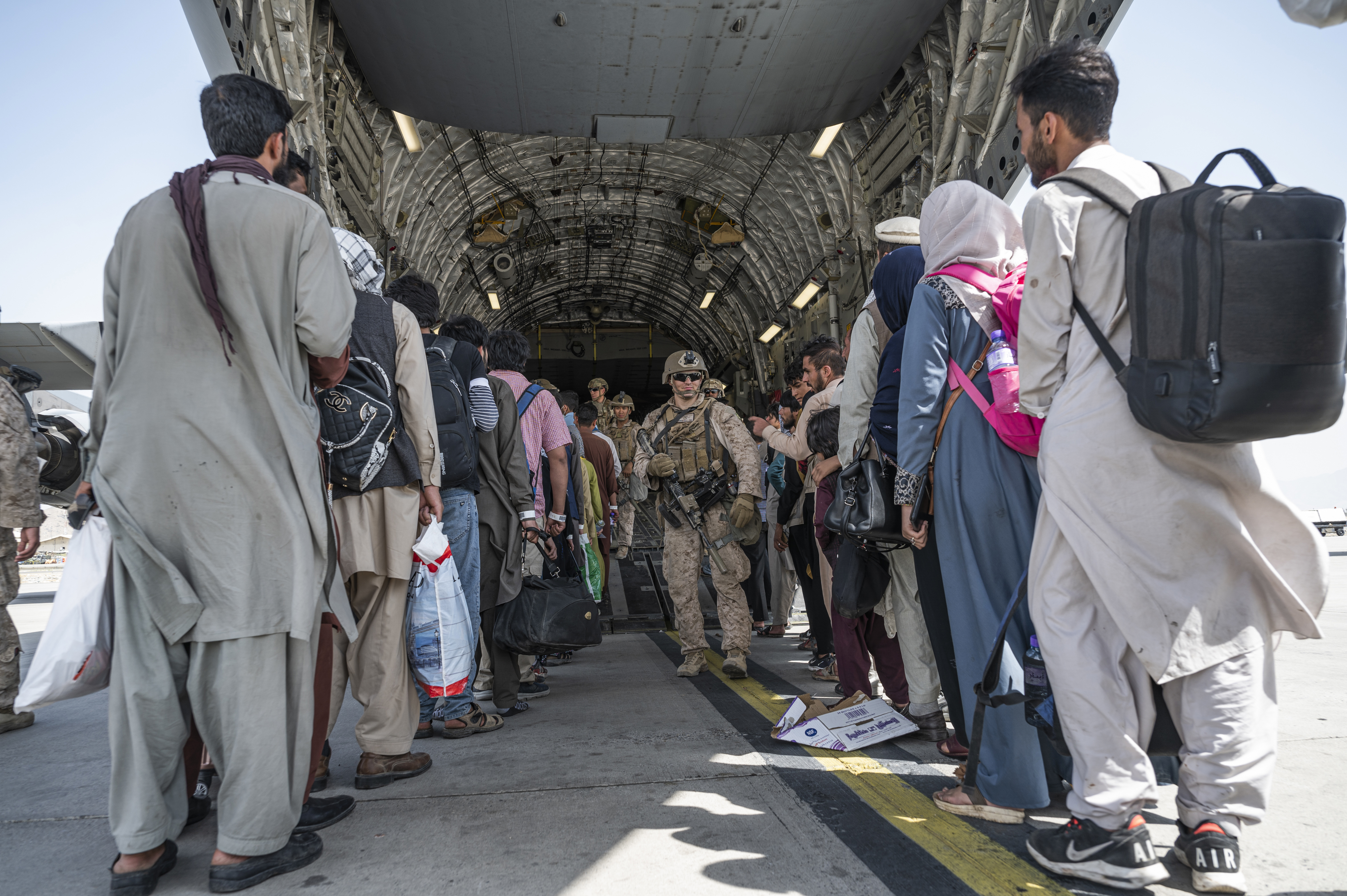 U.S. soldiers aid Afghan refugees in Kabul, Afghanistan