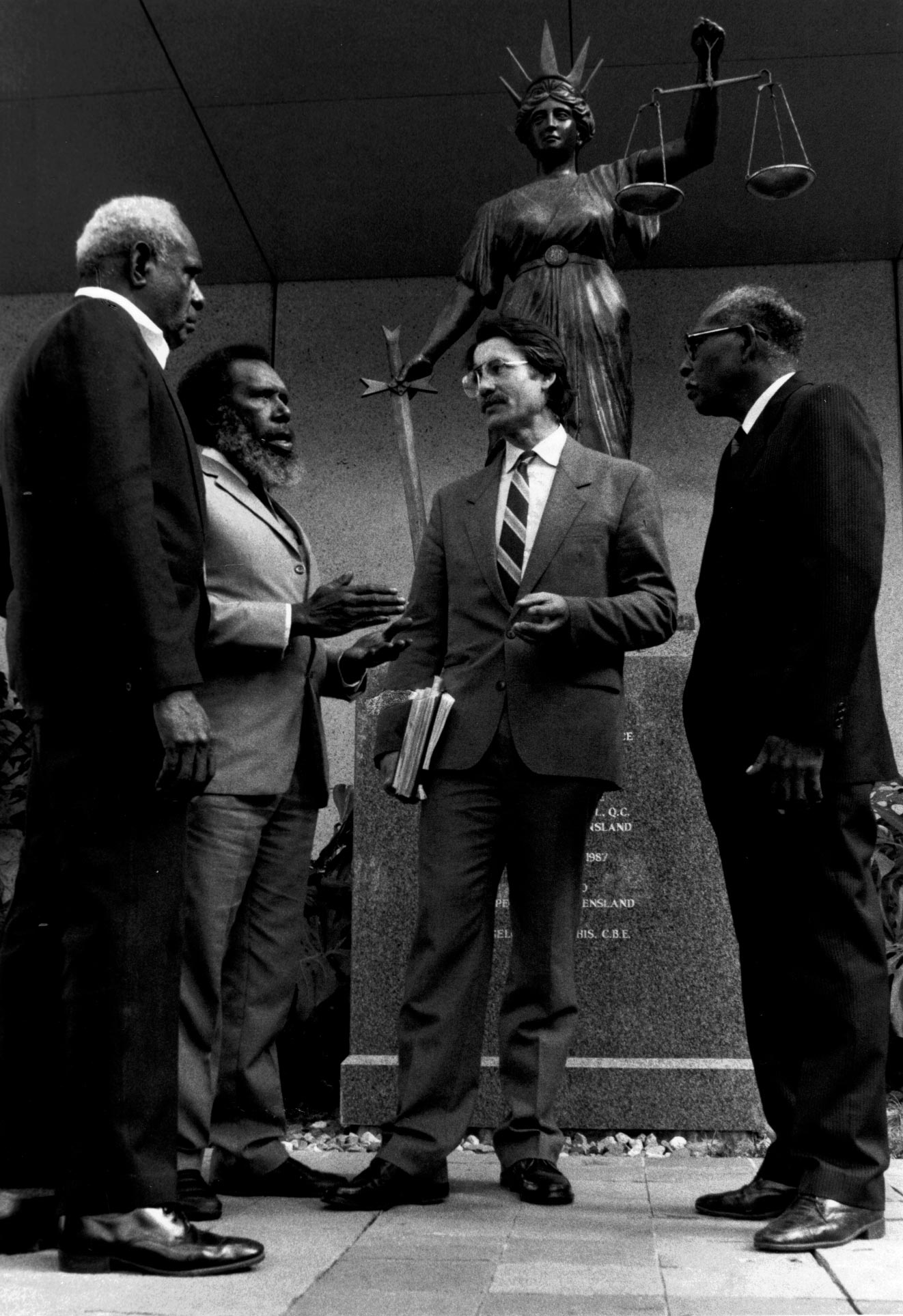 Eddie Koiki Mabo, second from left, worked to secure Indigenous land rights in Australia.