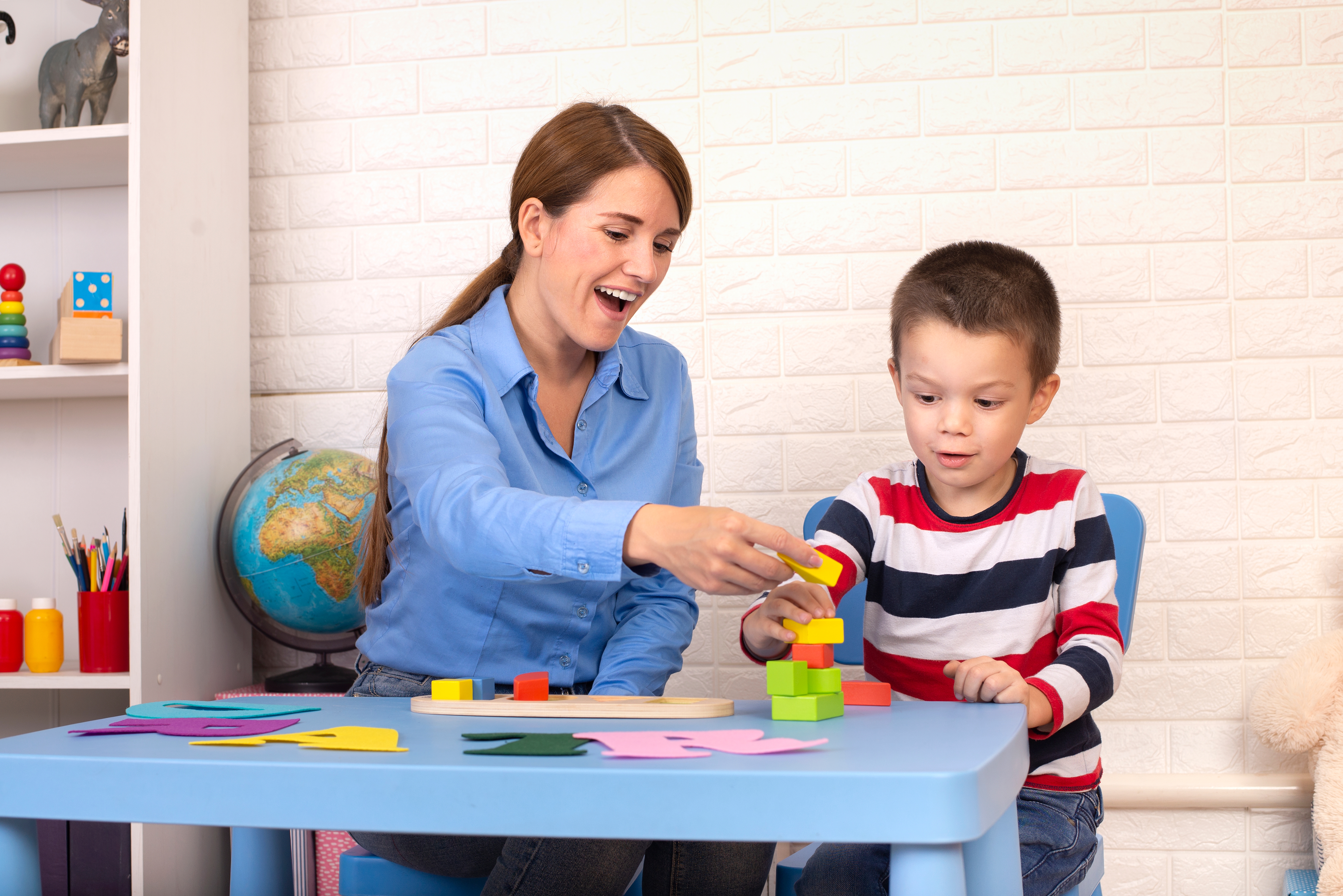 Occupational therapist helping a child