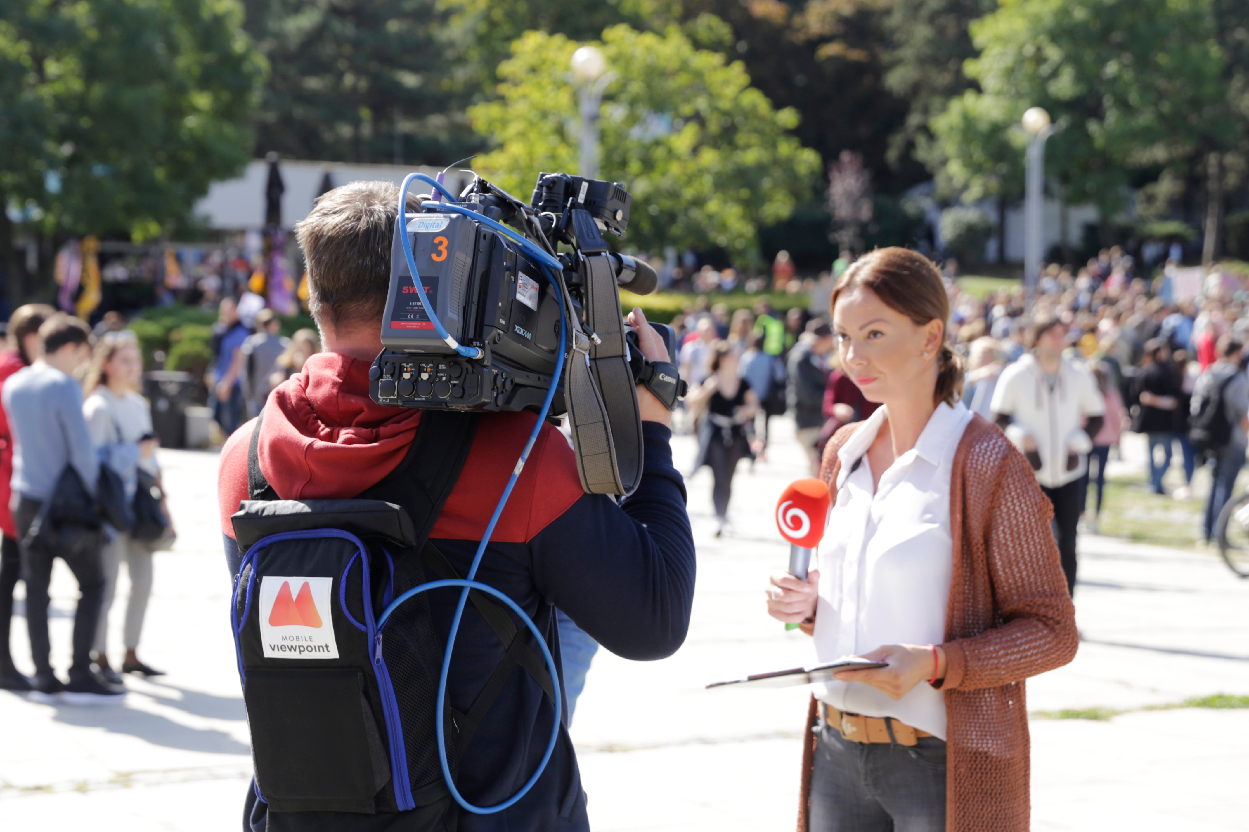 A television reporter covers a story in Bratislava, Slovakia