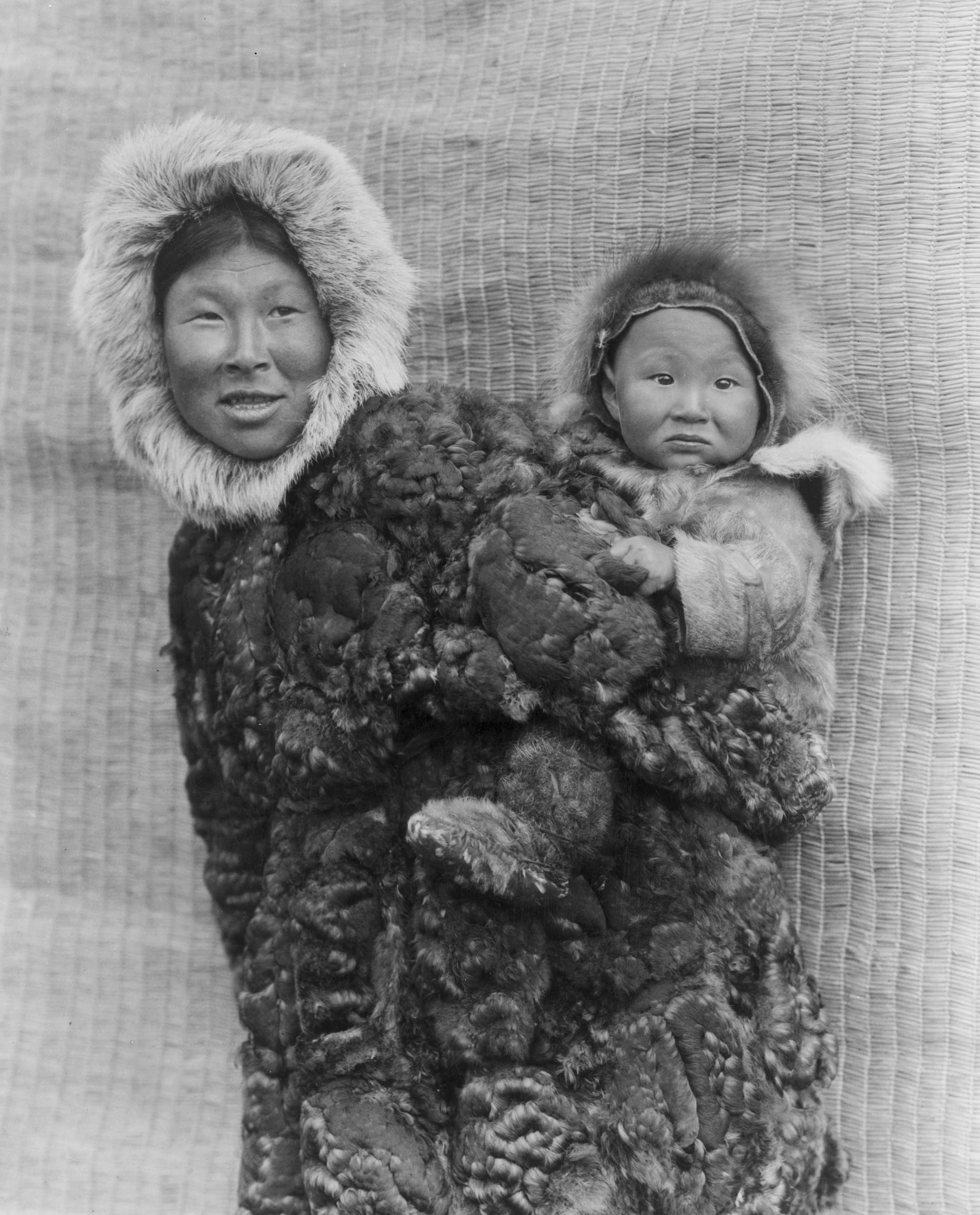 Yuit woman and child on Nunivak Island