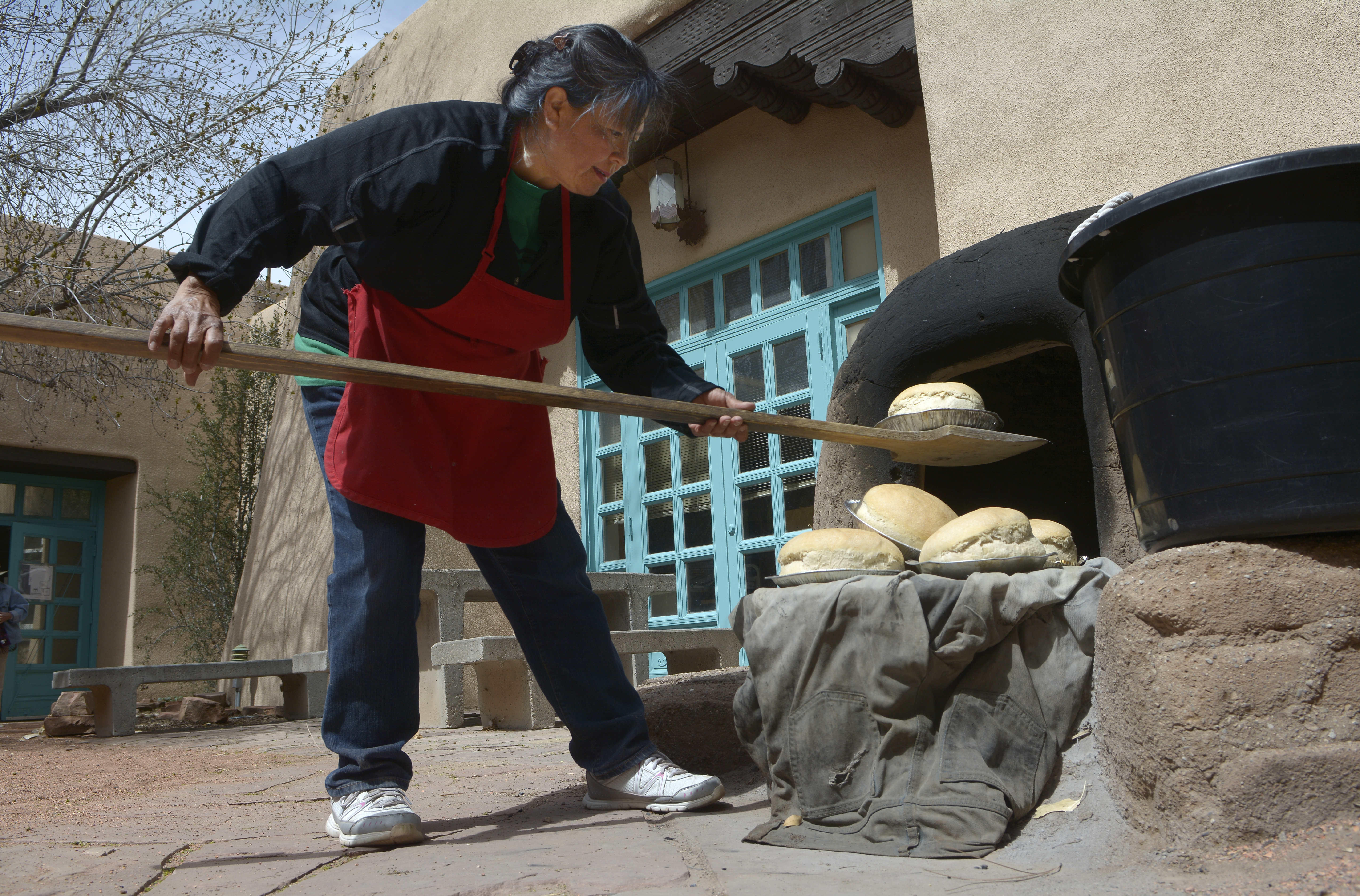 Baking bread at Isleta Pueblo in New Mexico